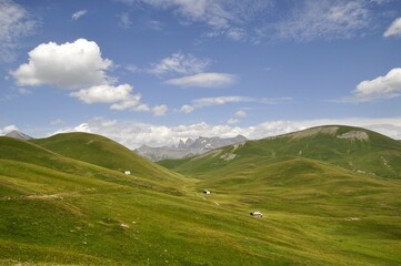 Obraz premium mountain landscape in summer, green grass, tour of the Ecrins and Oisans Massif, hiking, trek, GR54, Alps, France