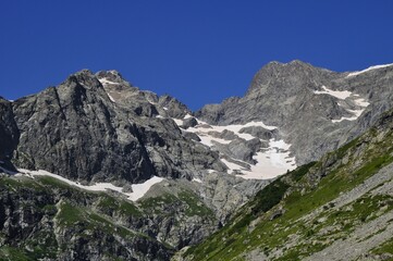 mountain peaks in the alps,  tour of the Ecrins and Oisans Massif, hiking, trek, GR54, Alps, France, summer, holidays.