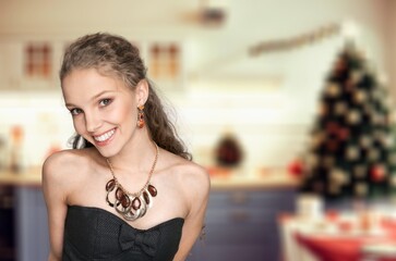 Luxury fashion beautiful woman over christmas tree