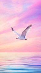 Obraz premium Graceful white seagull gliding over pastel-hued ocean, silhouetted against vibrant sunset sky with pink and violet colors