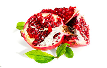 Pomegranate. Fresh juicy Pomegranates with leaves isolated on white Background. Organic Bio fruits. 