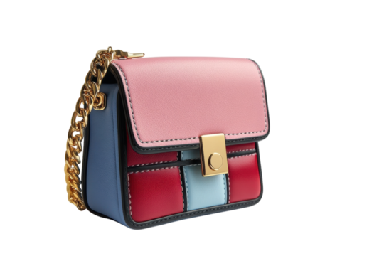 Colorful small handbag with chain strap and stylish geometric pattern on display against a plain background