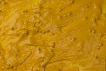 Yellow sauce splashes as a background.