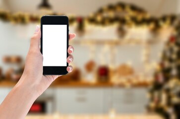 mobile phone with blank screen and Christmas  background.