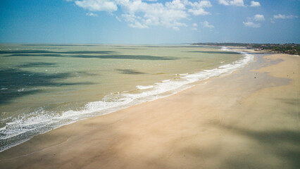 Aerial View of Calhau Beach, São Luís – White Sand, Blue Waters, and Coastal Skyline on a Sunny Summer Day