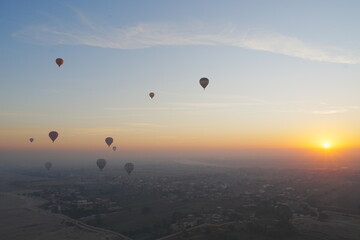 Balloons at sunrise over Luxor, Egypt