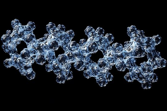 A cluster of abstract glassy blue structures against black background