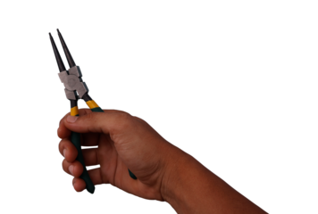 Hand holding snap ring pliers on transparent background