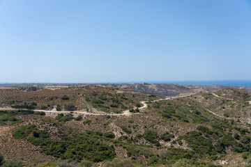 Scenic view to coast from high hills on Greek Island