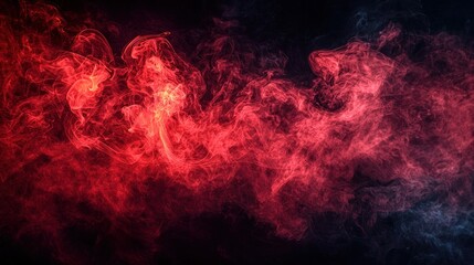 Fototapeta premium Red and blue smoke swirls against black background