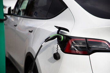 electric car charging in a parking