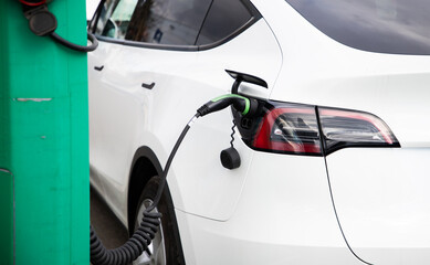 electric car charging in a parking