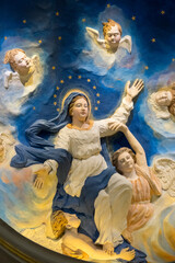 Bas relief (19th century) of Assumption of the Blessed Virgin Mary to the heaven.