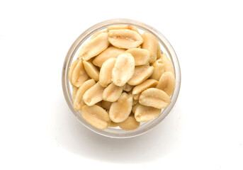bowl with peeled peanuts on white background