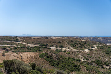 Obraz premium Scenic view to coast from high hills on Greek Island