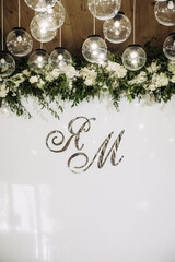 Discover Elegant Wedding Decor featuring Exquisite Floral Arrangements and Custom Initials