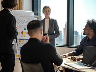Business Team Collaborating in Modern Office During Strategy Meeting