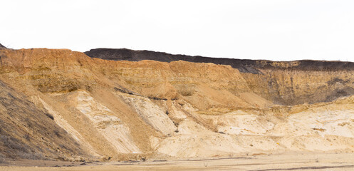 A large sand quarry. The place of sand extraction on an industrial scale.