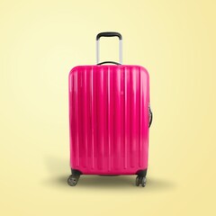 Colored classic suitcase on light background