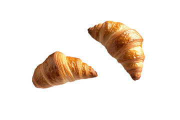 Two croissants are flying in the air, isolated