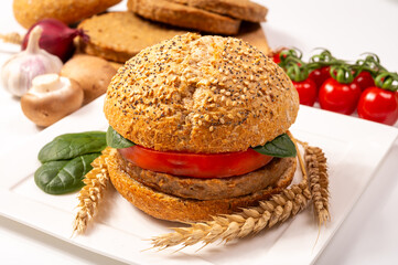 Make burger buns with vegan or vegetarian patties or burgers made from grains, vital wheat gluten food, grilled healthy food