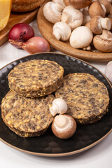 Tasty organic vegetarian food, burgers with champignons mushrooms, cheese and onion