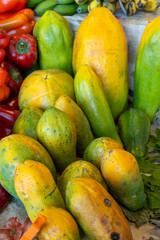 Fresh ripe organic tropical fruits and vegetables on farmers market on Tenerife, Canary islands, Spain, sweet bio papaya fruits, local food and products