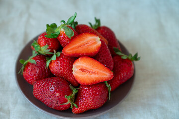 New harvest, plate with bio ripe red sweet strawberry from Tenerife, Canary islands, Spain,...