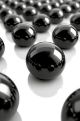 Glossy Black Spheres on Reflective Surface Creating a Modern Abstract Background