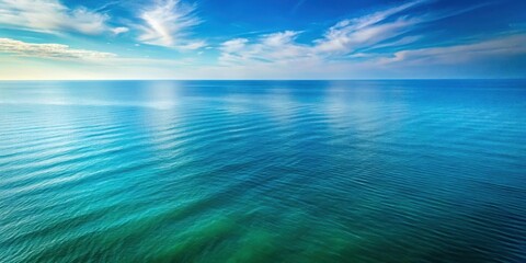 Obraz premium Serene Ocean Vista A Breathtaking Panorama of Calm Waters Under a Vivid Blue Sky