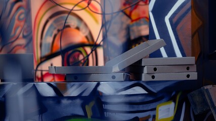 Empty spray paint cans left over in messy ghetto by urban explorers venturing into abandoned...