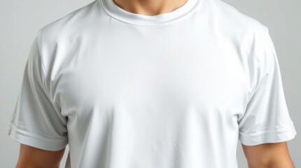 A tight close-up shot focuses on the detailed texture of an oversized white t-shirt mockup on a man's body, showing only the torso