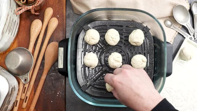 Baking cinnamon sugar donut holes with an air fryer.  Using an air fryer to bake.  