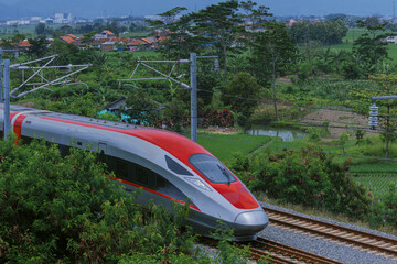 Bandung, Indonesia - 21.02.2025: Departure of the Whoosh high-speed train from Tegalluar Bandung...