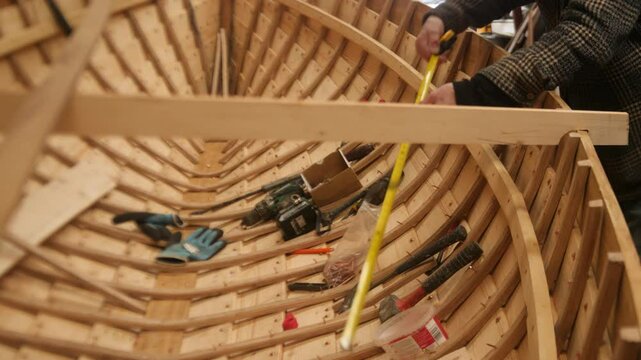 Handcrafted Wooden Boat, measuring for stringers