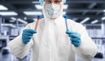 Naklejka premium Scientist holding chemical test glass tube science laboratory.