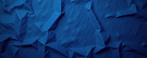 Fototapeta premium Rough, uneven woven cotton surface, deep indigo blue , woven fabric, indigo fabric, worn