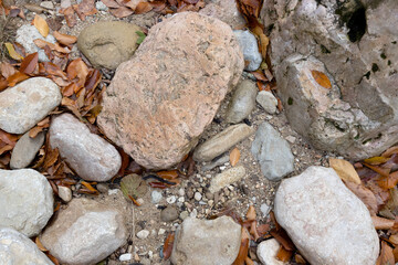 the structure of the bottom and the stone placer of the riverbed and the mountain range located in the gorge