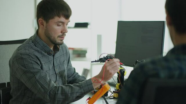 Dedicated software developers collaborate in cyberspace, focusing on secure data systems and innovative programming techniques in modern office.