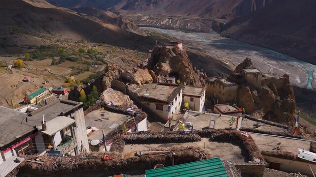 View of the roof of the buildings as seen from top of the Dhankar Gompa near Kaza in Spiti Valley, Himachal Pradesh, India. Scenic village view in the Himalayas. Ancient monastery in India.