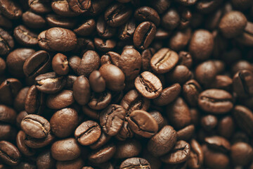 Macro photo of roasted coffee beans background 