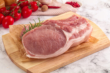 Raw potk loin steak with bone