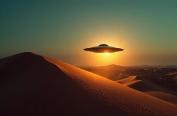 Strange object hovers over desert dunes during sunset