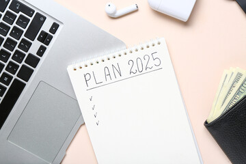 Notebook with empty to do list, laptop and money on pink background