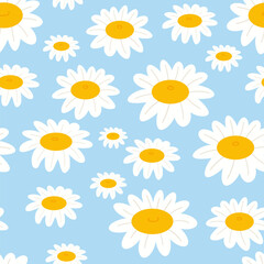 Obraz premium Seamless chamomile flower on blue background. Beautiful floral pattern for print. ​​Flat design vector.