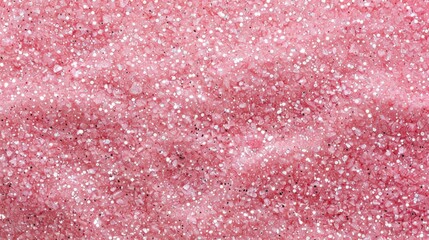 Fototapeta premium Close-up of shimmering pink glitter texture