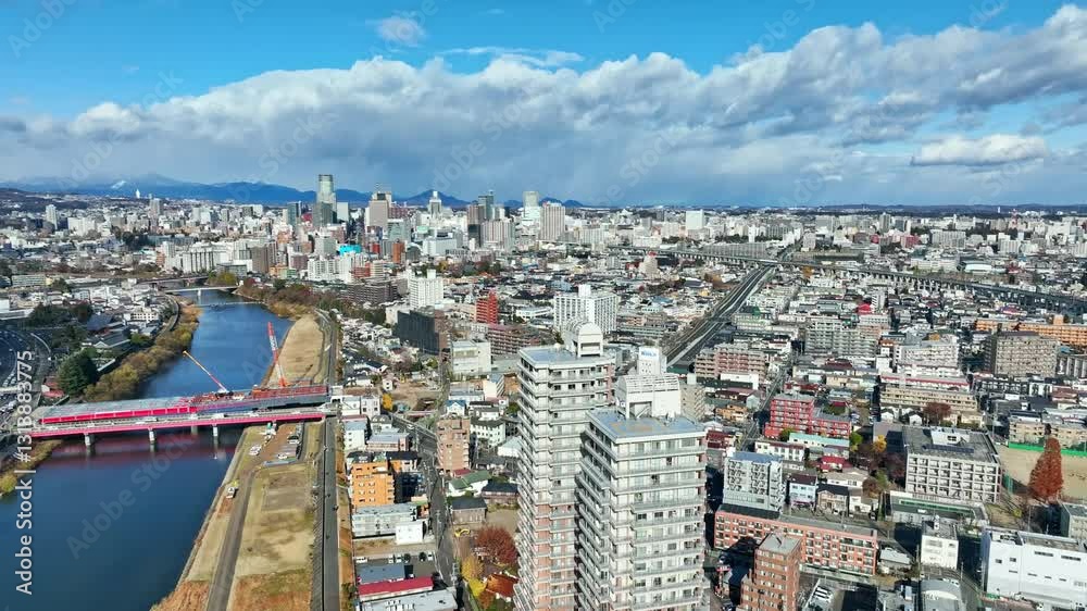 Aufkleber 都市、住宅地、住宅、マンション、空撮、ドローン、社会、不動産、建設、インフラ、行政、時代、俯瞰、ハイアングル、景色、展望、パノラマ、地平線、景観、風景、都会、町並み、街、上から見た、見下ろす、現代、建築、ビル、高層ビル、タワーマンション、日本、公共、地方、自治体、地域、ビジネス、産業、道路、交通、事業、企業、テクノロジー、旋回、回転、青空、昼間、晴れ、広大、60p、広角