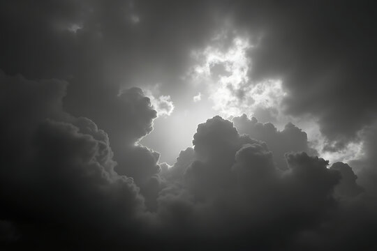 A highly detailed monochrome stormy sky, featuring dramatic rolling clouds in deep shades of gray, creating a moody and atmospheric effect