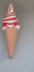 A Wall Mounted Model of an Ice Cream Cone.