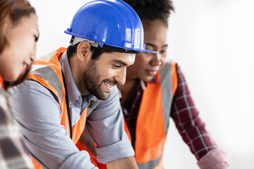 Team Construction or engineering group and worker. Teamwork and determination to succeed. Safety...